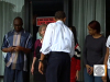 Avid texter pauses briefly to shake Obama's hand