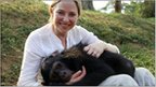 Dr Alice Roberts and a chimpanzee in Uganda 