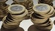 Precarious towers of one Euro coins