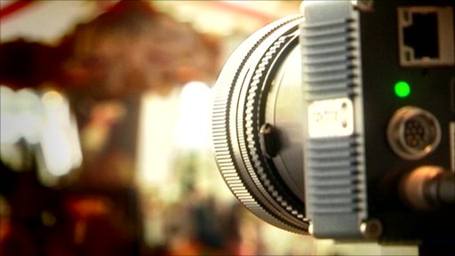 Camera pointed at a fairground