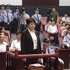 Gu Kailai, wife of ousted Chinese Communist Party Politburo member Bo Xilai, attends a trial in the court room at Hefei Intermediate People's Court