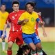 Ronaldinho (BRA) fight the ball against Li Weifeng (CHN) at Olympics Games