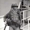 Photo: A Pvt. with the 11th Infantry Brigade arriving at Qui Nhon, South Vietnam in December 1967. He is wearing the Olive Green shade 107 Utility Shirt adopted in 1963.