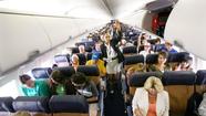 Airlines shrink seats, offer extra legroom for a fee