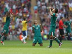 Diego Reyes of Mexico falls to his knees and celebrates winning gold 