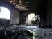 A Libyan man checks out the interior of the U.S. Consulate in Benghazi, Libya, after the attack. Defense Secretary Leon E. Panetta has said there was not enough information to commit military forces. (Associated Press)