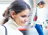 Fashion blunder! Katie Holmes misfires in creased flares and dowdy jumper... just a day after wowing at Sandy relief concert