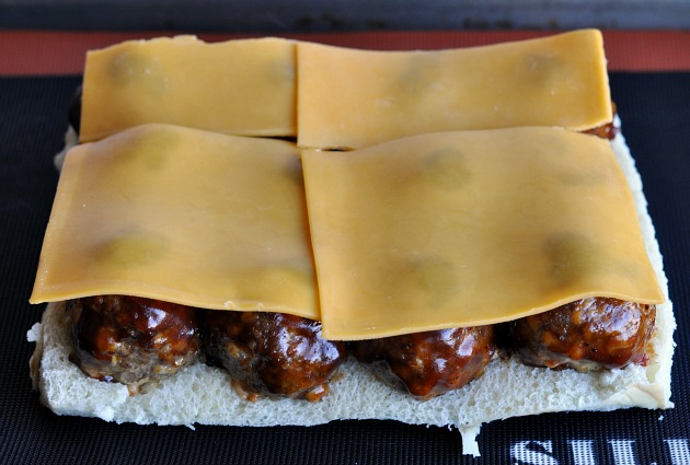 Smokey Mesquite BBQ Sliders topped with cheddar cheese