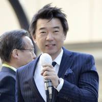 No invite: Nippon Ishin no Kai (Japan Restoration Party) co-chief and Osaka Mayor Toru Hashimoto makes a stump speech on his home turf in December. | KYODO