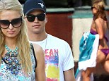 Blue outing: Paris Hilton and her beau River Viperi wore matching colored clothes to shop in Malibu