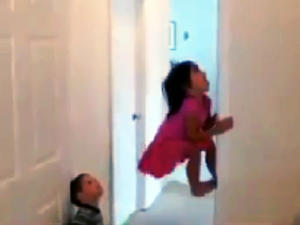 Dad challenges kids to climb walls to get candy