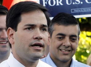 FILE - In this Republican U.S. Senate candidate Marco Rubio, left, talks to reporters as David Rivera, Republican candidate for Congress, right, looks on in Miami. Rubio's relationship with fellow freshman lawmaker Rivera, now facing a federal probe into tax evasion, and a credit card controversy surfaced during his 2010 Senate campaign and didn't have much effect. But that doesn't mean the country as a whole would overlook such eyebrow-raising issues, if Rubio were to show interest in the No. 2 slot on the presidential ticket this year. (AP Photo/Alan Diaz, File)