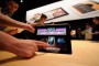 
Members of the media preview the new iPad during an Apple product launch event March 7. With its new tablet, Apple added better cameras, 4G LTE and a couple of significant upgrades to the tablet, all with the aim of making it a better machine for content creation.
