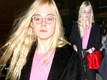 Chic traveller! Elle Fanning dons retro-styled eyeglasses and bright red Miu Miu purse as she arrives at LAX after Paris Fashion Week