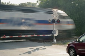 A train passes through the Chestnut Street grade crossing in Gaithersburg, Md. (Tom Fedor/The Gazette)