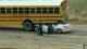 Car crashes into, gets trapped under school bus in Colorado
