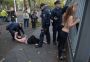 Topless Femen activists protest in front Iranian embassy in Germany