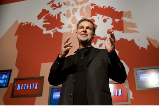 “People ask, ‘oh you mean $7.99 a movie’ . . . And no, no, no, it’s $7.99 for unlimited TV shows and movies per month," says Netflix CEO Reed Hastings in Toronto.