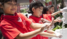 Schoolgirls in Jakarta washing their hands with Lifebuoy soap.