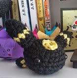 http://www.ravelry.com/patterns/library/tiny-umbreon