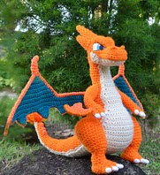 http://www.ravelry.com/patterns/library/mega-charizard-y
