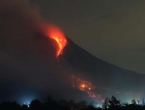 Indonesians evacuated airports close as volcanoes erupt