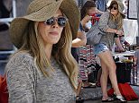 16.AUGUST.2015 - STUDIO CITY - USA\n*STRICTLY AVAILABLE FOR UK AND GERMANY USE ONLY*\nAMERICAN ACTRESS HILARY DUFF IS AN ADORABLE MAMA IN AN OVERSIZED FLOPPY HAT AND SUNGLASSES AS SHE ENJOYS A BEAUTIFUL DAY AT THE FARMERS MARKET IN STUDIO CITY.  HILARY DUFF KEPT  WATCHFUL EYE ON HER LITTLE BOY LUCA COMRIE AS HE WENT ON THE INFLATABLE SLIDE. HILARY WORE A OVERSIZED FLOPPY HAT, SUNGLASSES, GREY SWEATER, DENIM CUFFED SHORTS, A CARTIER BRACELET AND CARRIED A GOYARD TOTE BAG\nBYLINE MUST READ : XPOSUREPHOTOS.COM\n***UK CLIENTS - PICTURES CONTAINING CHILDREN PLEASE PIXELATE FACE PRIOR TO PUBLICATION ***\n*UK CLIENTS MUST CALL PRIOR TO TV OR ONLINE USAGE PLEASE TELEPHONE 0208 344 2007*