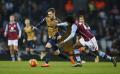 Arsenal on top as Spurs and Liverool drop points