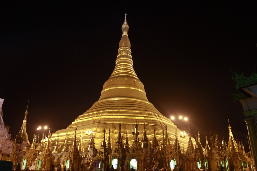 The lit-up gold of the Shwedagon Pagoda can be seen across the city of Yangon at night The Shwedagon Pagoda at night (photo by Grace, one of our writers)