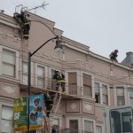 Firefighters responding to a three-alarm fire near 16th and Valencia Sts. in San Francisco's Mission District climb a fire escape.  (Photo courtesy Kate Paloy)
