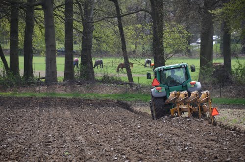 The farmers do there work by preparing the fields for seeding so that they can earn money with the harvest at Hoge Erf Schaarsbergen