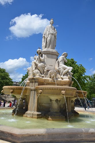 Monumental fountain statue at Nimes central square