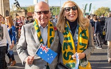 Rupert Murdoch arriving with Jerry Hall at Twickenham Stadium, London to support Australia in the Rugby World Cup final