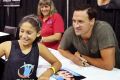 New look: Ryan Lochte is photographed by a young fan at Wizard World Comic Con in Virginia at the weekend.