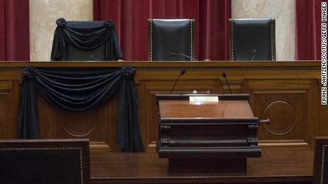 WASHINGTON, DC - FEBRUARY 15: In this handout from the the Supreme Court of the United States, U.S. Supreme Court Associate Justice Antonin Scalia&#39;s Bench Chair and the Bench in front of his seat draped in black after his death on February 15, 2016 in Washington, DC. Scalia died February 13, reportedly of natural causes, at a resort in Texas.  (Photograph by Franz Jantzen/Collection of the Supreme Court of the United States via Getty Images)
