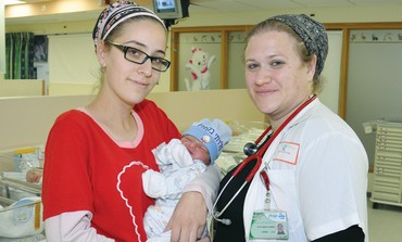 NEW MOTHER Rotem Bar (left) and Dr. Hanni Olivestone pose with the newborn at Kaplan Medical Center 