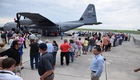 Hundreds of people line up to tour the U.S. Air Force WC-130J hurricane hunter aircraft during its stop in New Orleans, La.