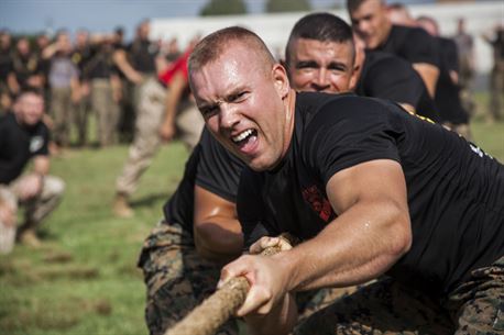 Second Lieutenant Tyler R. Watkins leads Delta Company during a field meet at Officer Candidates School, aboard Marine Corps Base Quantico, Va., Aug. 4, 2016. Once an NCAA Division I athlete, Watkins transitioned from trying to play football professionally to his dreams of becoming a Marine officer. He graduated OCS with Officer Candidate Class 222, which had the most OCS graduates since 2009, on Aug. 6, 2016. Due to injuries sustained during OCS, he is temporarily assigned to the Plans and Research section at Marine Corps Recruiting Command aboard MCB Quantico. Watkins hopes to return to training in March 2017.