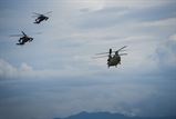 Two UH-60 Blackhawk and a CH-47 Chinook helicopters prepare to land at Soto Cano Air Base Oct. 17.  The aircraft are returning from Haiti where Joint Task Force - Bravo was mobilized in support of Joint Task Force – Matthew for hurricane relief after the category four storm devastated the island.  