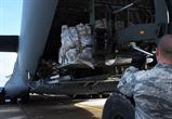 U.S. Air Force Staff Sgt. Dustin Jett, 612th Air Base Squadron senior information controller, halts a forklift as it loads equipment into a C-17 Globemaster cargo aircraft destined for Port-au-Prince, Haiti to support Joint Task Force Matthew hurricane relief operations, Oct. 8, 2016 at Soto Cano Air Base, Honduras. Approximately 200 Soldiers, Airmen and Marines from Special Purpose Marine Air-Ground Task Force-Southern Command and Joint Task Force-Bravo deployed this week with two CH-53E Super Stallion, three CH-47 Chinook, and two UH-60L and two HH-60L Black Hawk helicopters to provide heavy and medium lift to support the U.S. Agency for International Development-led mission. (U.S. Air Force photo by Capt. David Liapis)
