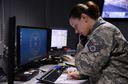 Staff Sgt. Erica Johnson, a 86th Airlift Wing command post senior emergency actions controller, takes a report Dec. 3, 2015, at Ramstein Air Base, Germany. The 86th AW command post is the largest reporting manager in U.S. Air Forces in Europe – Air Forces Africa supporting five wings, 12 groups, 57 squadrons, six bases and 39 geographically separated units. (U.S. Air Force photo/Airman 1st Class Tryphena  Mayhugh)