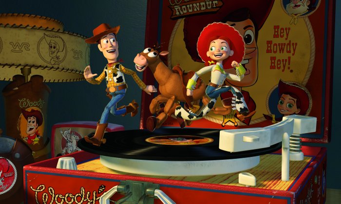 Toy Story 2 characters dancing on a record Toy Story 2 animatedfilmreviews.filminspector.com