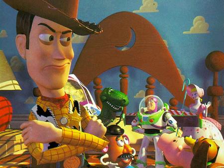 Woody in Toy Story giving evil look Toy Story 1995 animatedfilmreviews.filminspector.com
