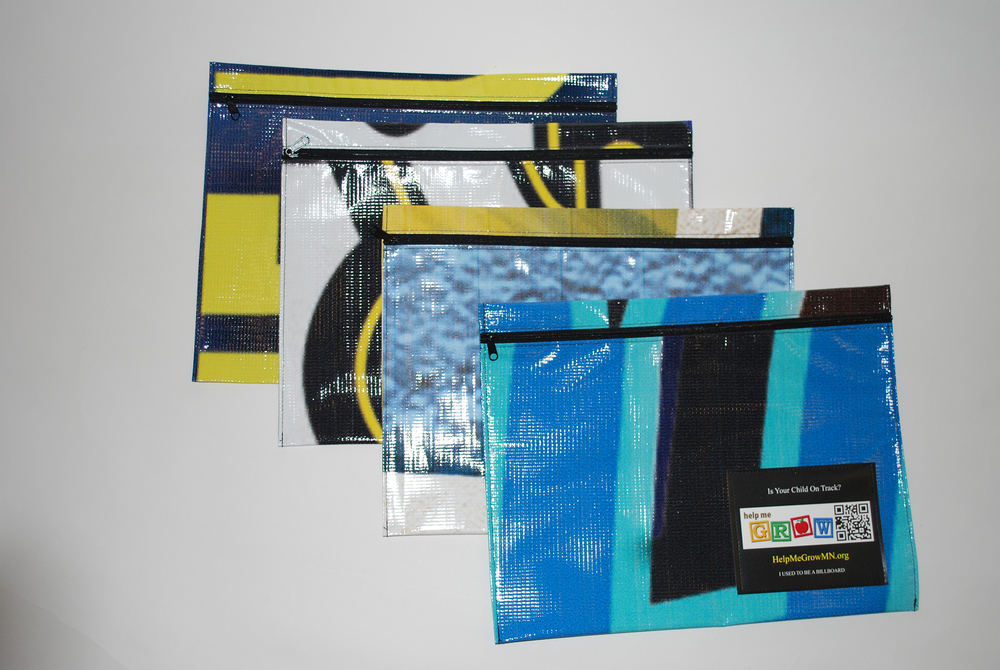 Document cases with zippered top made from upcycled material that can house all of your documents