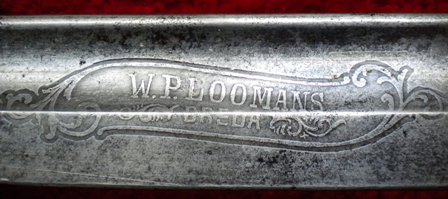 Logo W.P. Loomans op cavaleriesabel M1895