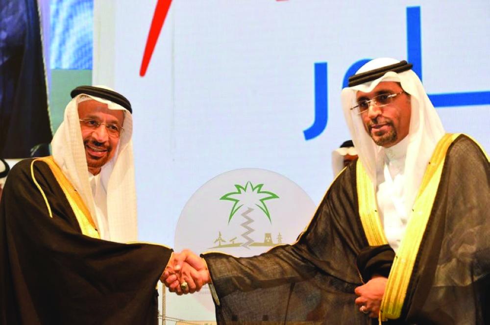 Minister of Energy, Industry and Mineral Resources Khalid Al Falih and Saudi Aramco Executive Director of Power Systems Eng. Abdulkarim Al-Ghamdi at the Saudi Electricity Forum