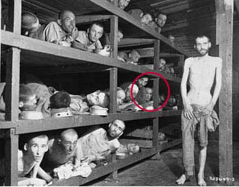 “Elie Wiesel looks out from the far right of the middle bunk.” This photo was staged in an empty barrack because the mattresses have already been removed, 5 days after liberation. 