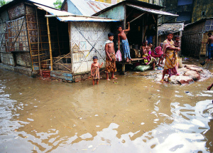 Floodwaters surround houses in Dhaka, Bangladesh, one of the world's most climate vulnerable countries.