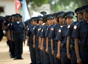 The thirty-third class of police officers of the Liberian National Police (LNP) participate in a graduation ceremony. Source: Africa Renewal (Flickr)