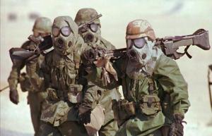 Soldiers in Gulf War wearing gas masks. Image by Wikimedia